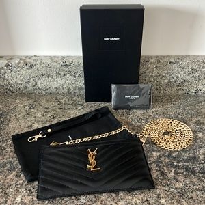 Yves Saint Laurent Black and Gold Clutch